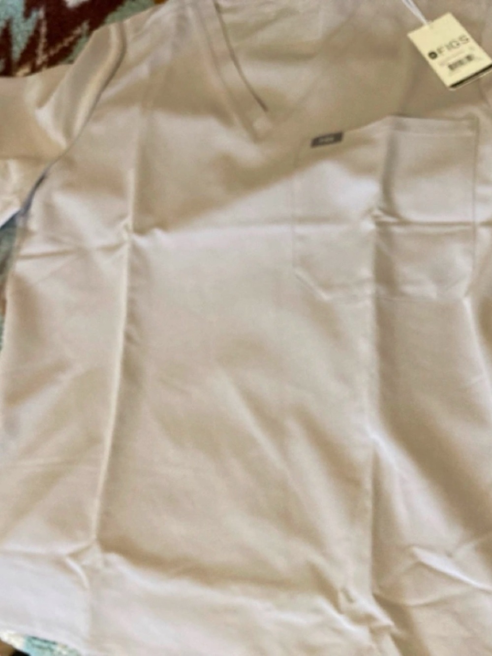 FIGS scrub top XL
One pocket on left side
In slate color
BNWT